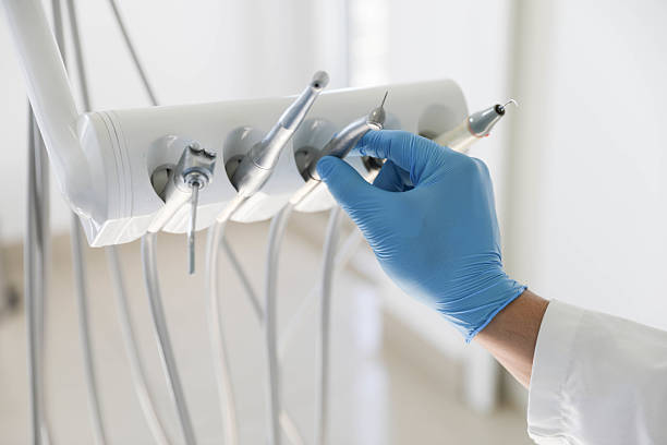 Professional Emergency Dentist technician working in Petersburg city County, VA